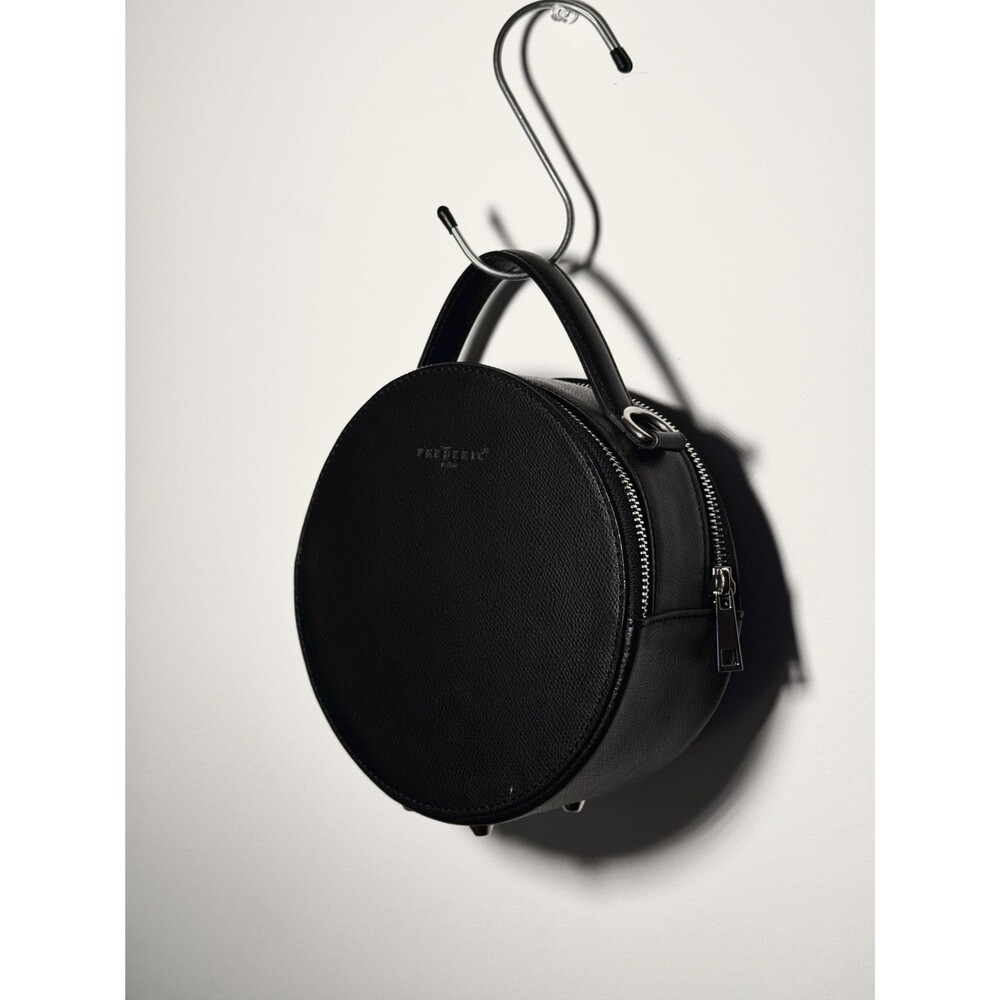 vintage minimalist black leather circle handbag by frederic paris